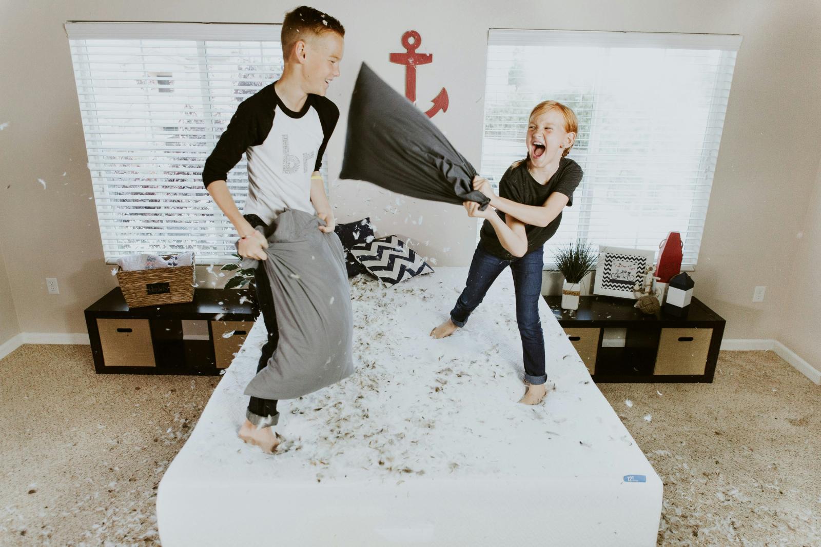 Kids having pillow fight